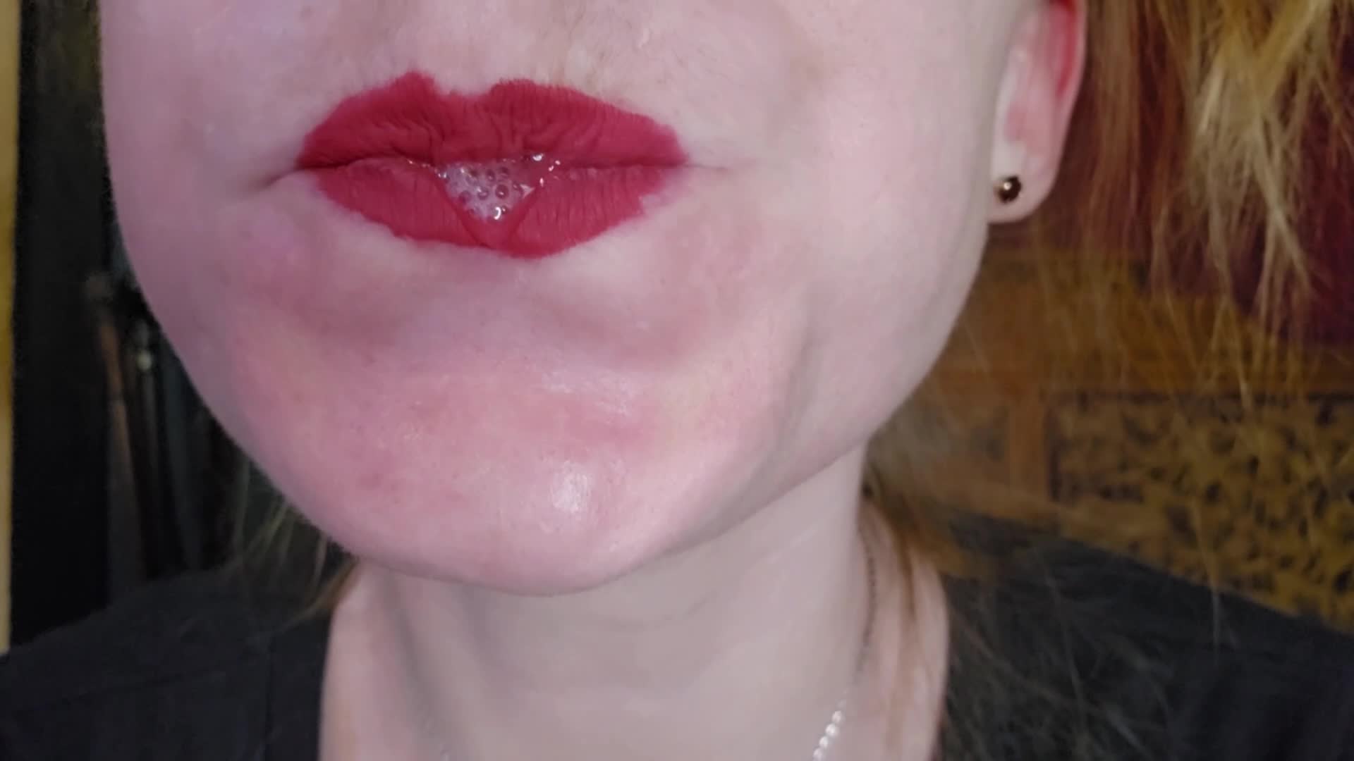 Red lips and lots of spit